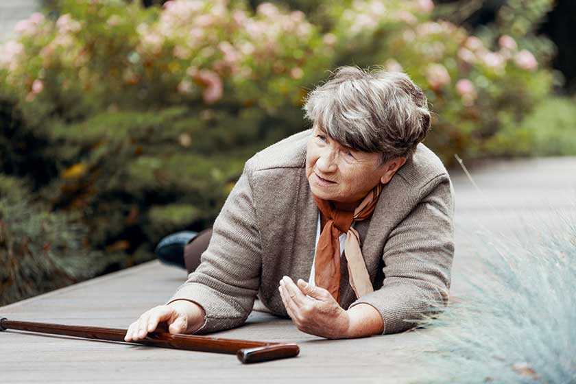 Senior laying on the ground after falling down Senior laying on the ground after falling down