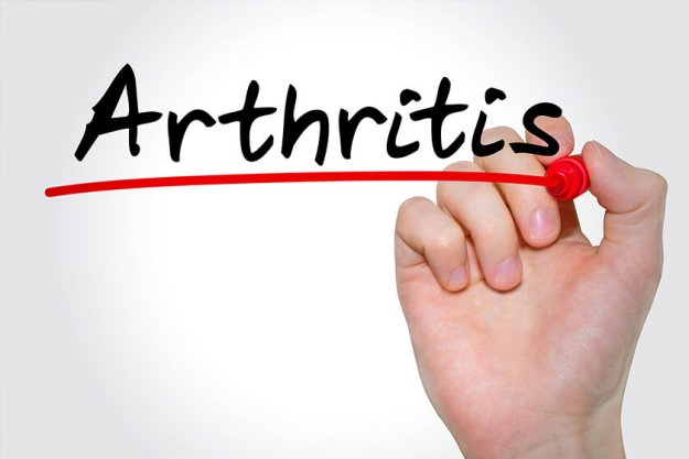 Hand writing inscription "Arthritis" with marker