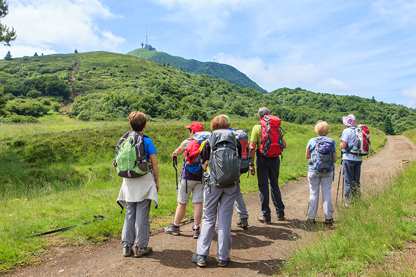 group of hikers looking at the summit