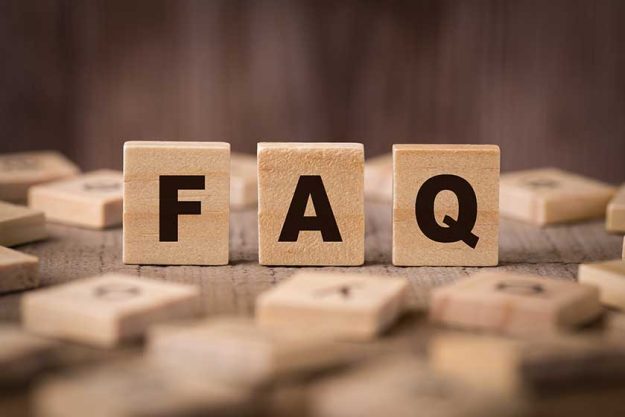 FAQ Sign With Wooden Background FAQ Sign With Wooden Background
