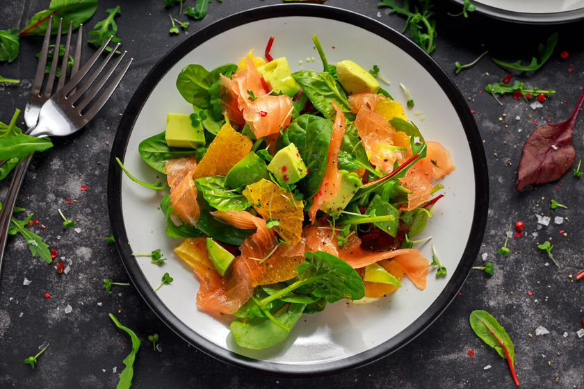 Fresh salmon salad with avocado, orange and green vegetables. Senior Nutrition: 5 Reasons To Include Seafood Into Your Meal Planning