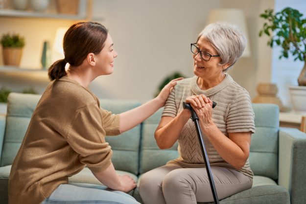 Elderly patient and caregiver Visiting Your Loved Ones In Assisted Living Community In Fort Worth, TX: 5 Tips To Follow