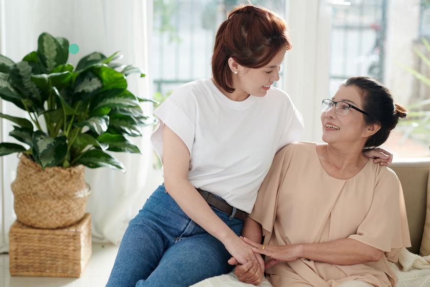 Woman Visiting Senior Mother at Home
