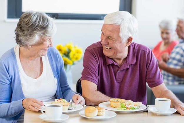 Senior couple having lunch together