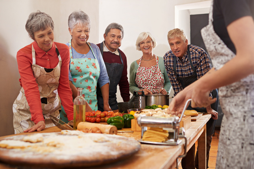 Youre never too old to learn. Shot of a group of seniors attending a cooking class. Youre never too old to learn. Shot of a group of seniors attending a cooking class.