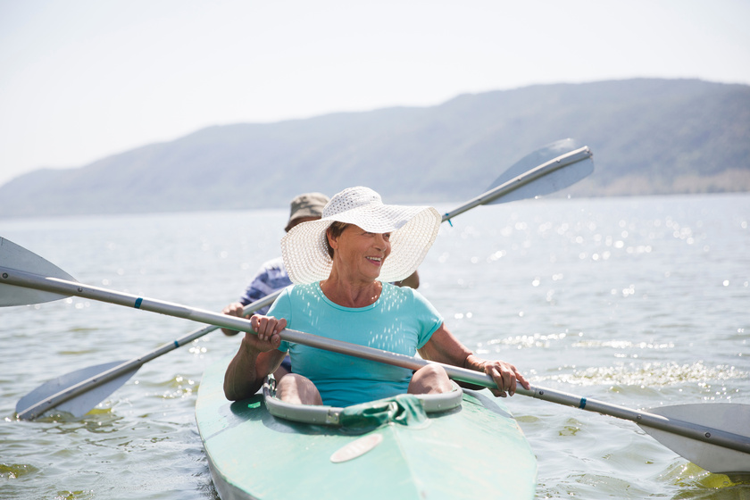 Senior couple enjoying kayaking on the river. Social Distancing Retire Near Lake Arlington, TX: A Guide Of Things To Do For Your Active Senior Years