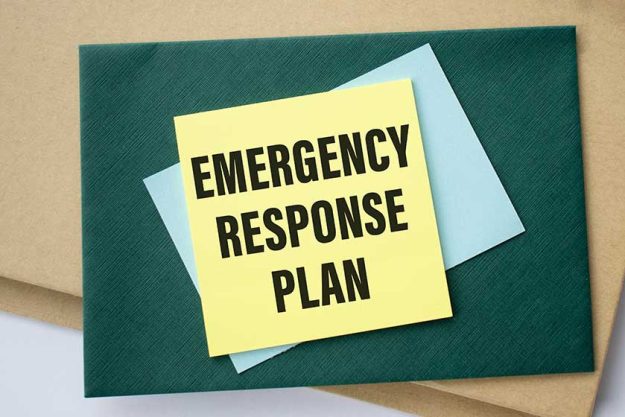 ERP as an emergency response procedure, the text is written on a yellow sticker lying on the office table among the papers.