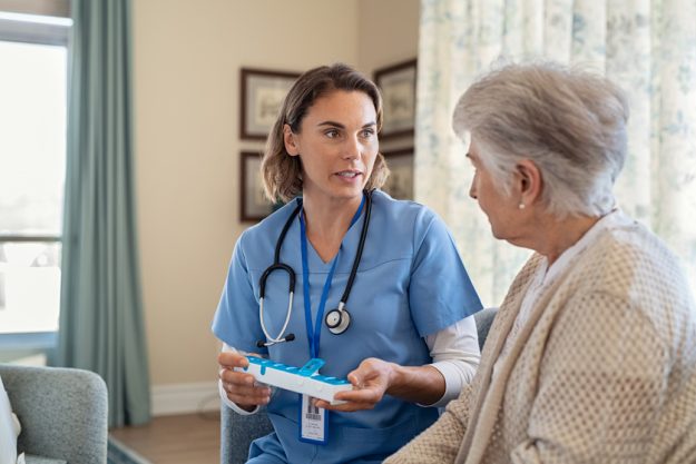 Nurse explaining medicine dosage to senior woman at nursing home How Assisted Living Apartments In Euless, TX, Help Residents With Multiple Medications