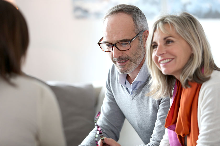 Senior couple meeting financial adviser