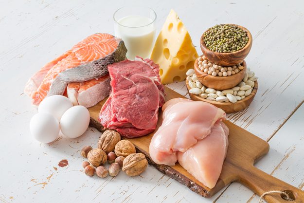 Selection of protein sources in kitchen background