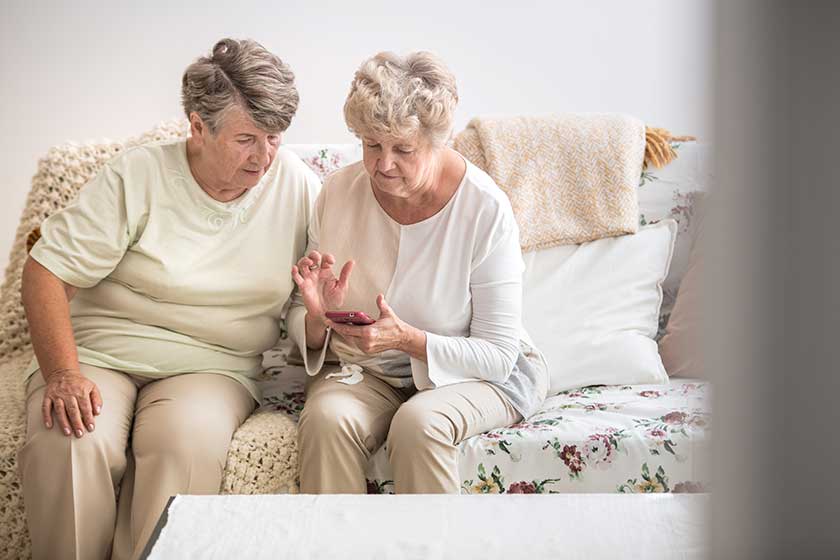Two Senior Woman Learning Together How Use Mobile Phone Two Senior Woman Learning Together How Use Mobile Phone