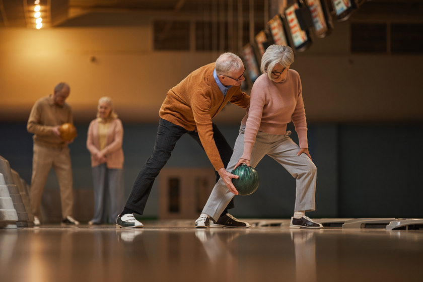 Active Senior Couple Playing Bowling Side View 5 Senior-Friendly Sports To Do In Your Alsuma, OK Senior Living