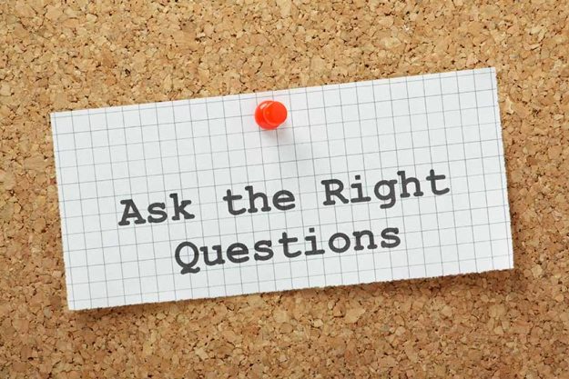 Ask The Right Questions on a cork notice board