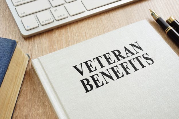 Book about Veteran Benefits on a desk Book about Veteran Benefits on a desk