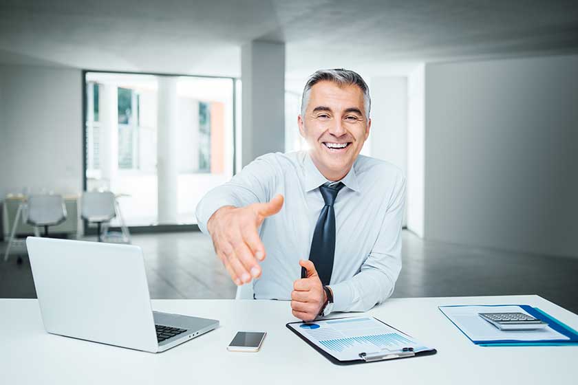 Businessman giving an handshake Businessman giving an handshake