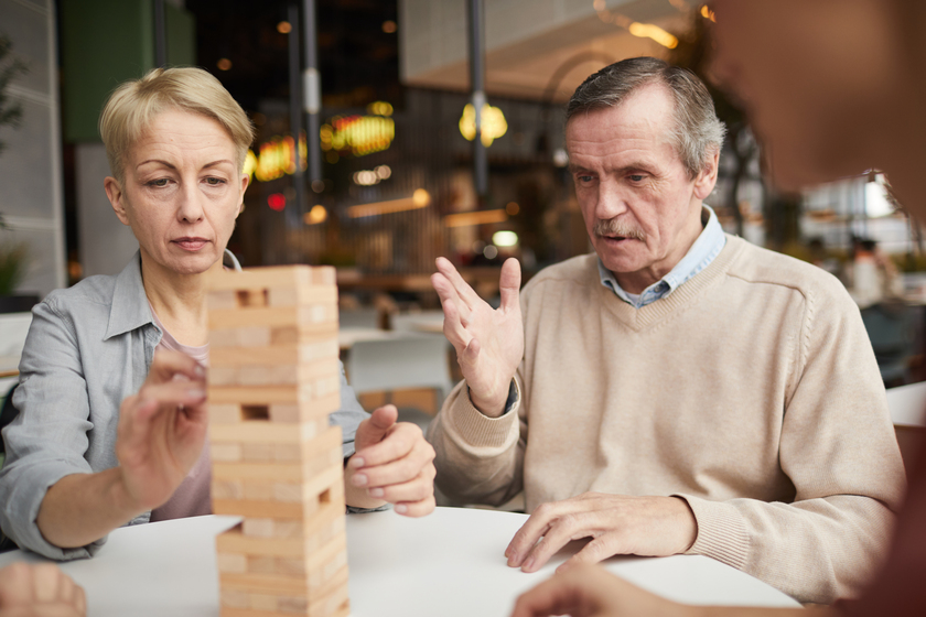 Mature couple playing in Jenga Memory Care For Alcoholic Dementia Patients: Is It The Right Solution?
