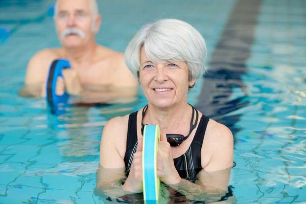 Senior woman doing water exercise