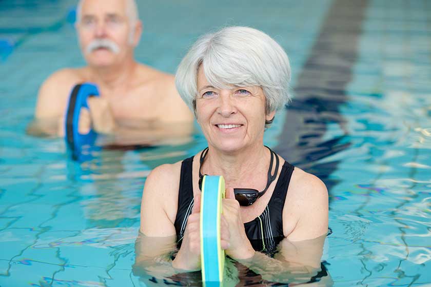Senior woman doing water exercise