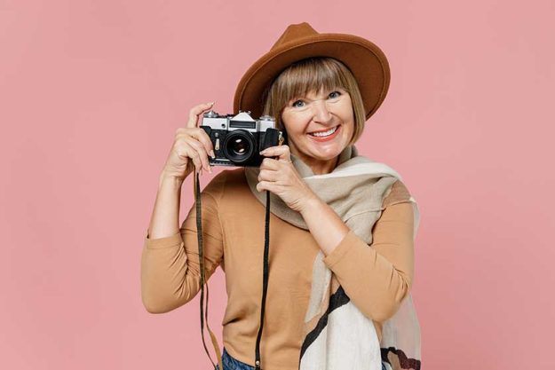 Traveler tourist smiling mature elderly senior lady Traveler tourist smiling mature elderly senior lady