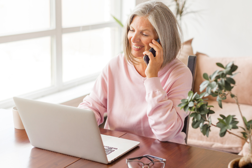 Happy stylish mature old woman remote working from home distance Choosing The Perfect Retirement Lifestyle In South Valley, NM Assisted Living Apartments: 4 Tips To Follow