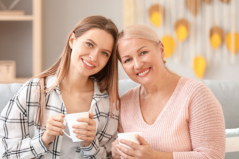 Mature woman and her adult daughter spending time together