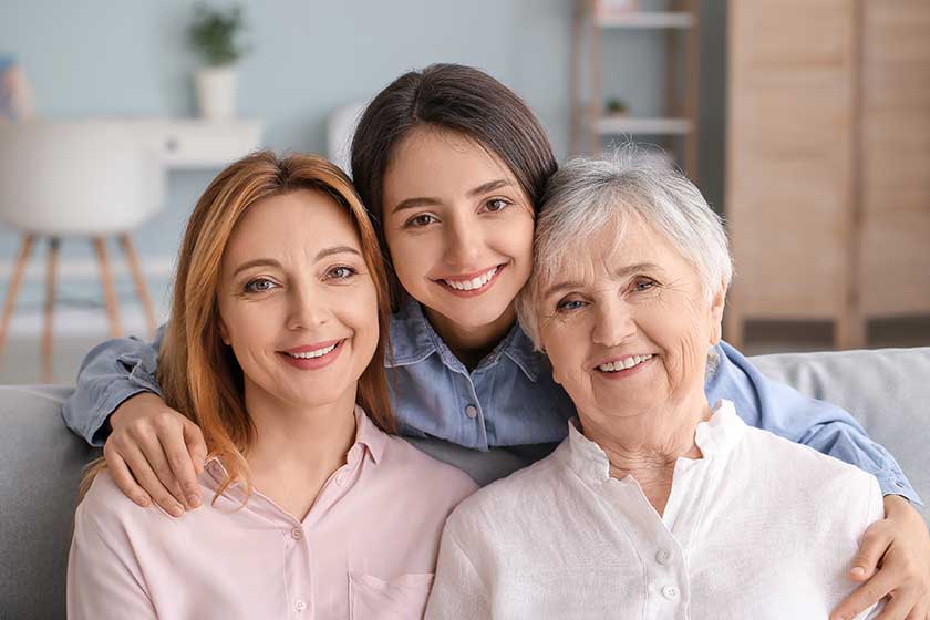 Mature woman with her adult daughter and mother