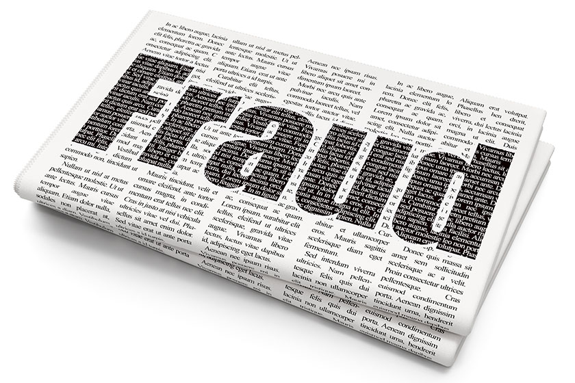 Pixelated black text Fraud on Newspaper background