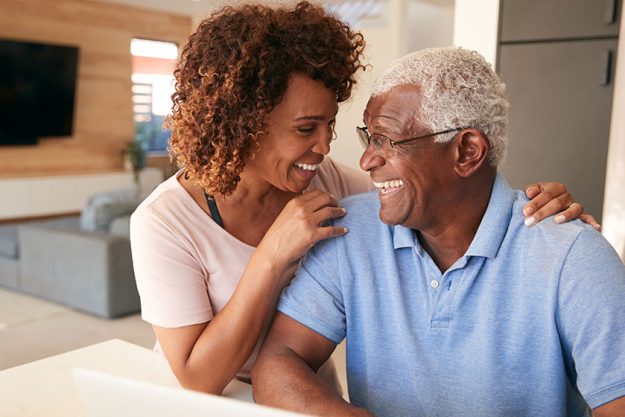 Senior African American Couple Using Laptop