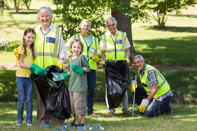 Happy family collecting rubbish Happy family collecting rubbish