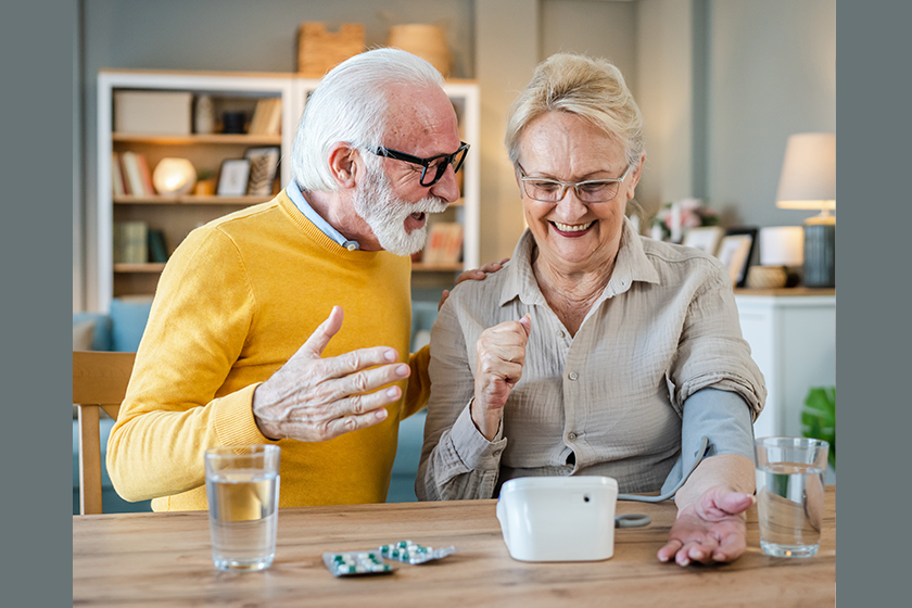 senior couple woman check measure blood pressure senior couple woman check measure blood pressure