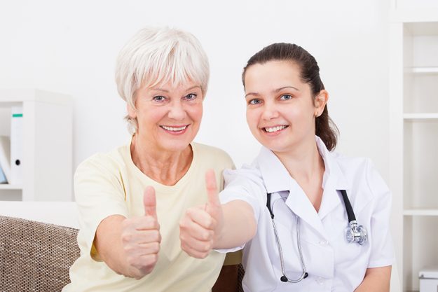 Doctor And Patient Showing Thumb Up