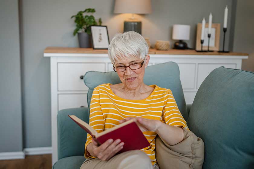 One woman mature senior caucasian female pensioner modern grandmother read One woman mature senior caucasian female pensioner modern grandmother read