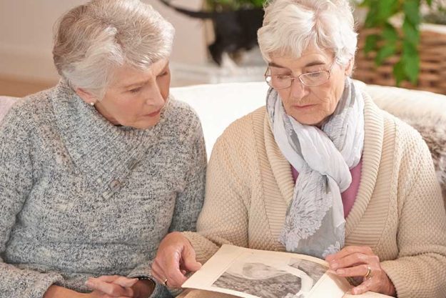 Things end memories last forever seniors looking photo album