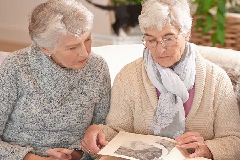 Things end memories last forever seniors looking photo album