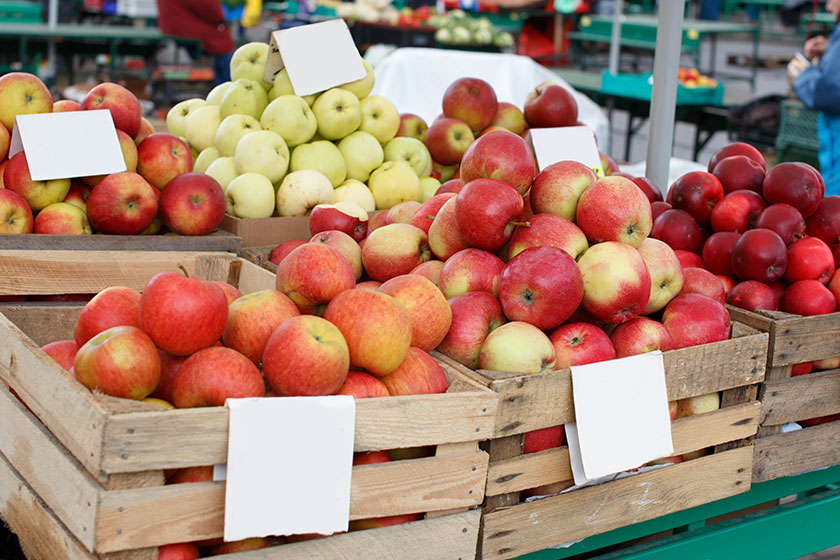 Crates with tasty apples on the market Crates with tasty apples on the market