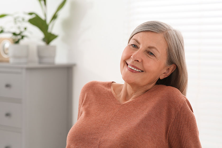 Portrait of beautiful senior woman at home