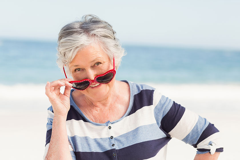 portrait of smiling senior woman portrait of smiling senior woman
