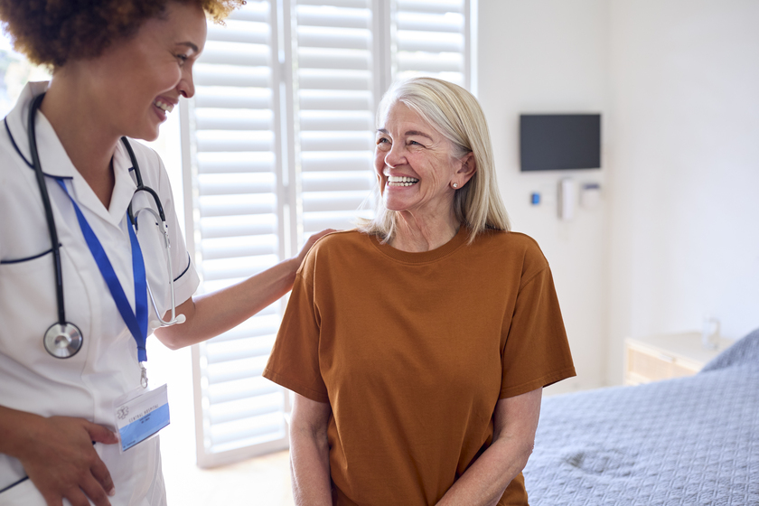 Female Nurse Wearing Uniform Meeting With Senior Woman Patient I Senior Housing Vs. Retirement Apartment Communities In Forest Hill, TX: How Are They Different?