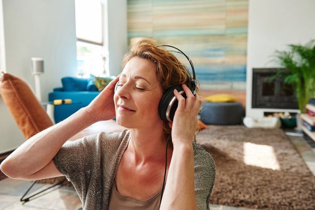 Woman wearing headphones Woman wearing headphones