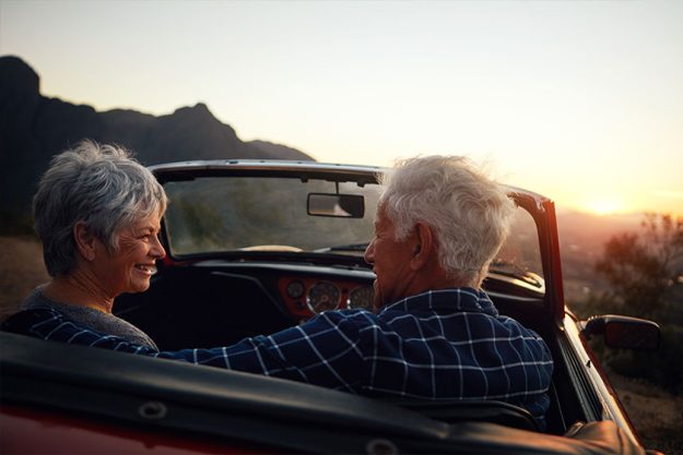 A senior couple enjoying a road trip A senior couple enjoying a road trip