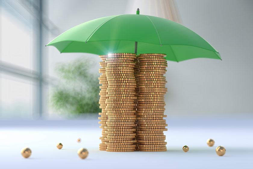 Gold coins protected umbrella concept insurance protection safe banking other