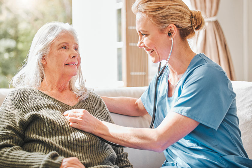 Your chest sounds clear female nurse listening her patients chest