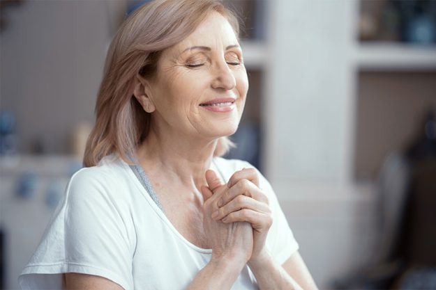 Beautiful woman over 50 years old enjoys yoga Beautiful woman over 50 years old enjoys yoga