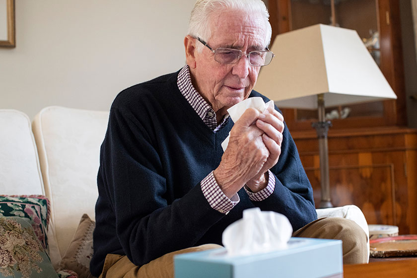 Senior man at home suffering with cold or flu virus Senior man at home suffering with cold or flu virus