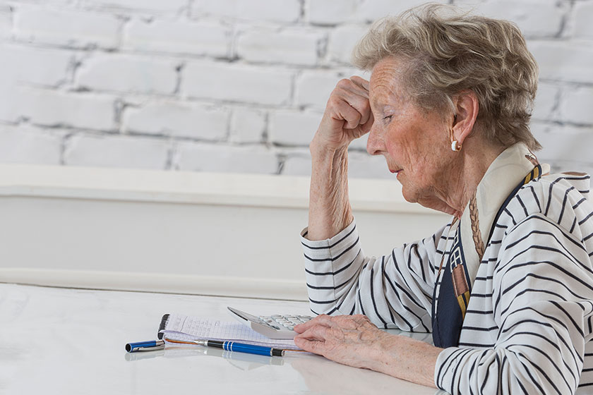 Senior woman doing paperwork