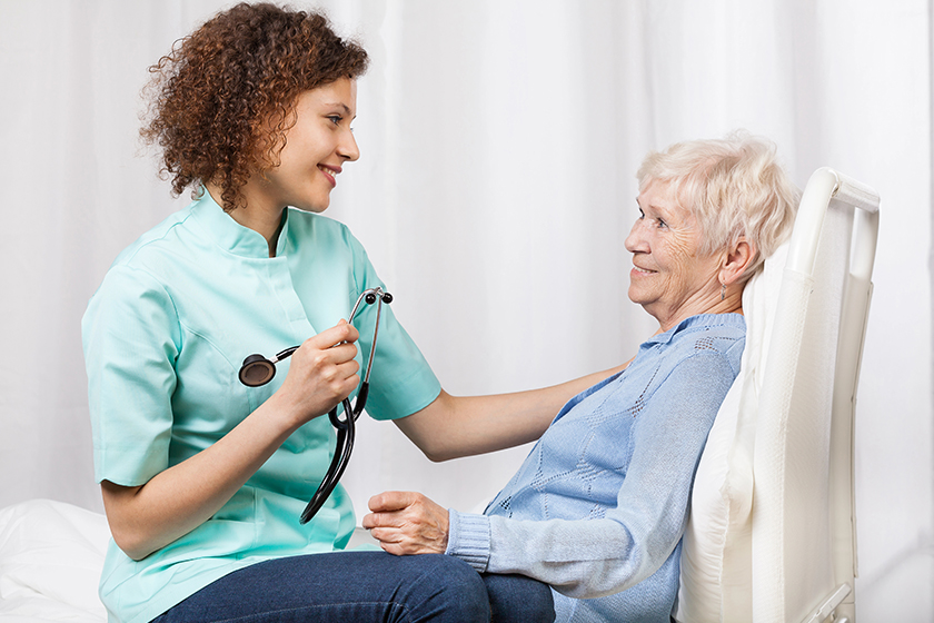 elderly woman and her nurse