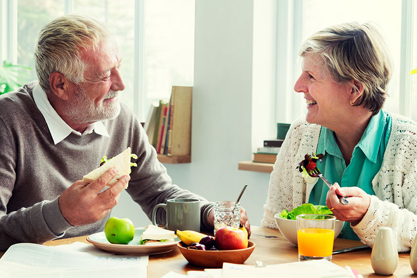 senior couple having breakfast senior couple having breakfast