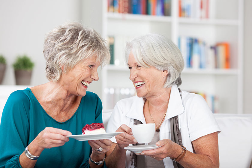 Two elderly ladies enjoy a cup of tea Two elderly ladies enjoy a cup of tea