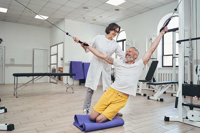 athlete undergoing the physiotherapy session with a physiotherapist