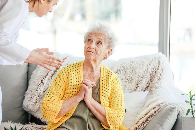 doctor mistreating senior woman in nursing home doctor mistreating senior woman in nursing home